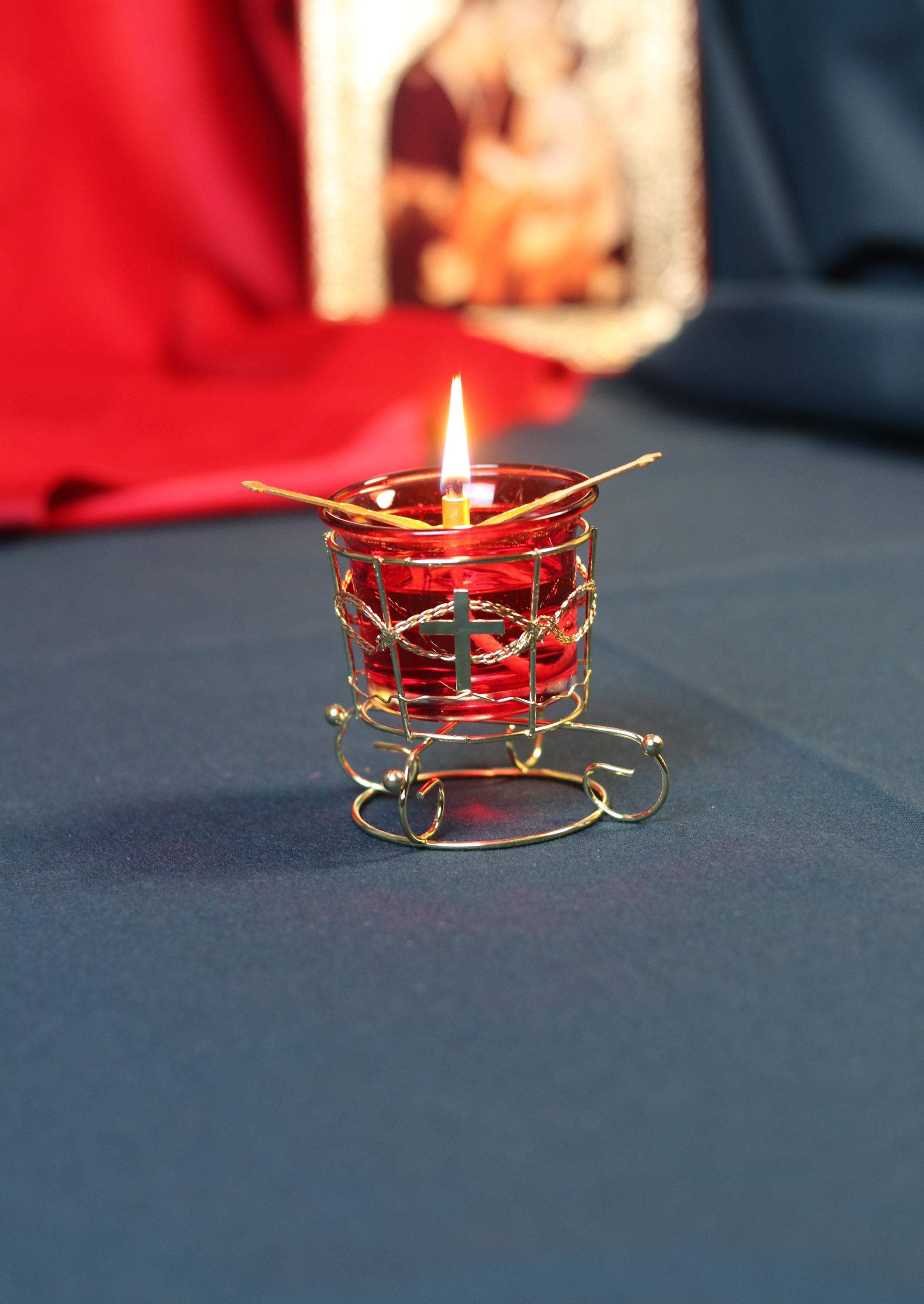 Christian prayer lamp. The set includes the lamp, 10 wicks, and a wick holder.